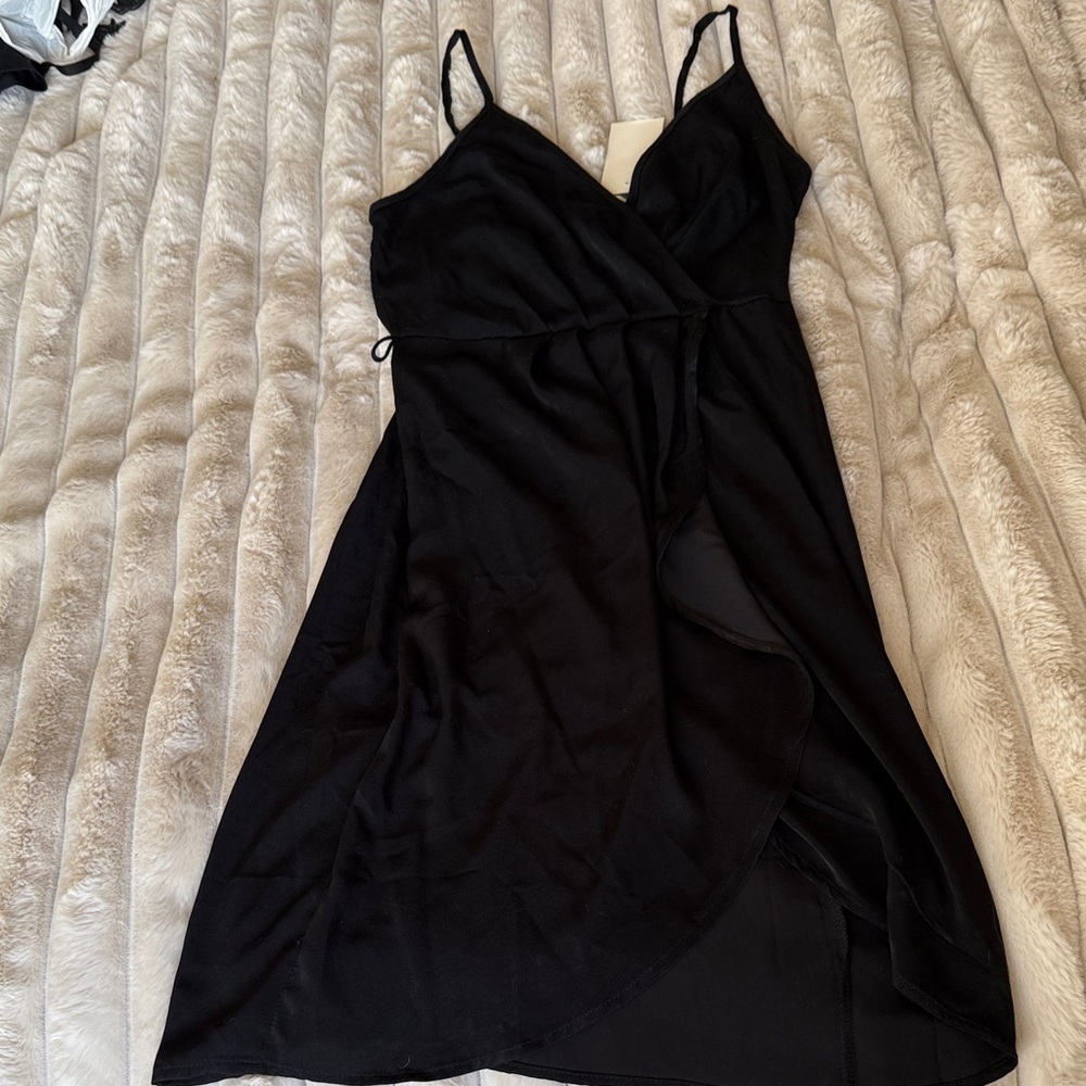 Elegant Black Wrap style dress strappy shoulders New Year’s Eve dress